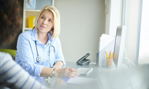 happy female doctor with her patient