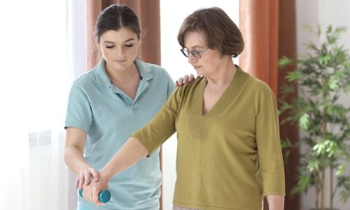 medium-shot-old-woman-holding-dumbbell